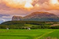 Sunset panoramic nature meadow hill rural field grass green sky panorama land country sunlight scenic outdoors valley sunrise blue Royalty Free Stock Photo