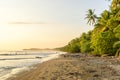 Sunset at paradise beach in Uvita, Costa Rica - beautiful beaches and tropical forest at pacific coast of Costa Rica - travel Royalty Free Stock Photo