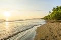 Sunset at paradise beach in Uvita, Costa Rica - beautiful beaches and tropical forest at pacific coast of Costa Rica - travel Royalty Free Stock Photo