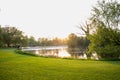 Sunset in a park over looking a lake