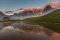 Sunset in Passo Rolle - Baita Segantini lake in Dolomite mountain range, Italy