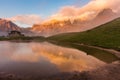 Sunset in Passo Rolle - Baita Segantini lake in Dolomite mountain range