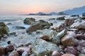 Sunset at the pebble beach. Crvena Glavica. Budva riviera. Montenegro Royalty Free Stock Photo