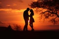 Sunset photo of silhouettes of a couple in love Royalty Free Stock Photo