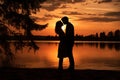 Sunset photo of silhouettes of a couple in love Royalty Free Stock Photo