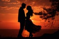 Sunset photo of silhouettes of a couple in love Royalty Free Stock Photo