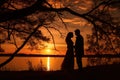 Sunset photo of silhouettes of a couple in love Royalty Free Stock Photo