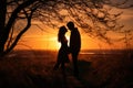 Sunset photo of silhouettes of a couple in love Royalty Free Stock Photo
