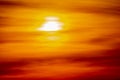 Sunrise and orange sky. Bright sun and clouds Royalty Free Stock Photo