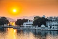 Sunset Pichola lake and Udaipur old town in India