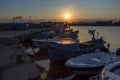 Sunset at the pier of Aheloy on the Black Sea with fishing boats Royalty Free Stock Photo