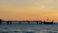 Sunset on a pier in Miedzyzdroje Poland Royalty Free Stock Photo