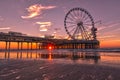 Sunset at the pier in Scheveningen Holland Royalty Free Stock Photo