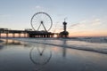 Sunset at the pier in Scheveningen Holland Royalty Free Stock Photo