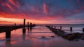 sunset at the pier A sunset or sunrise landscape, panorama of beautiful nature, beach with colorful red, orange and purple Royalty Free Stock Photo