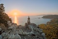 Sunset with pile of balancing stones. Royalty Free Stock Photo