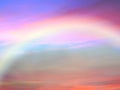 Sunset pink and  blue sky  with rainbow at sky ,fluffy clouds skyline beautiful landscape background   summer  nature Royalty Free Stock Photo