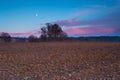 After sunset plowed field landscape