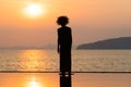 Sunset point with modern scary old woman silhouette sculpture in Ao Nang, Krabi, Thailand