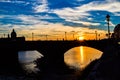 Sunset in Ponte alla Carraia alla Carraia Bridge through Arno