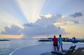 A couple enjoying sunset in the port of Male among the Maldivian islands in the Indian Ocean Royalty Free Stock Photo