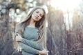 Sunset portrait of a pretty calm young woman