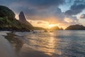 Sunset at Praia do Cachorro Beach with Morro do Pico on background - Fernando de Noronha, Pernambuco, Brazil Royalty Free Stock Photo