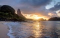 Sunset at Praia do Cachorro Beach with Morro do Pico on background - Fernando de Noronha, Pernambuco, Brazil Royalty Free Stock Photo