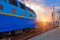 Sunset at the railway station Royalty Free Stock Photo