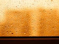 Sunset rain drops of water on the window glass background Royalty Free Stock Photo