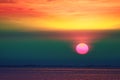 sunset on rainbow sky back evening cloud over twilight fishing on sea Royalty Free Stock Photo