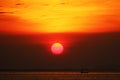 sunset on rainbow sky back evening cloud over twilight fishing on sea Royalty Free Stock Photo