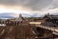 Sunset rays illuminate the charming landscape of Roros, featuring the town\'s landmark church and wooden architecture Royalty Free Stock Photo