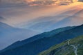 Sunset rays over hazy Pusteria valley Alto Adige Sudtirol Italy Royalty Free Stock Photo