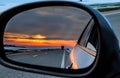 Sunset in Rearview Mirror Royalty Free Stock Photo