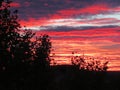 Sunset red clouds spectacular beautiful strange sky different Royalty Free Stock Photo