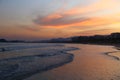 Sunset with red sky on the beach. Riviera beach, Bertioga, Brazil