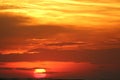 sunset on red yellow sky back soft evening cloud over horizon sea Royalty Free Stock Photo