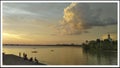 the sunset is reflected in the clouds creating the effect of the second sun, evening walk over the river, boat ride