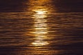 Sunset reflected on ocean waves Royalty Free Stock Photo