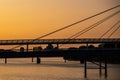 Sunset Reflected on the River Clyde in Glasgow Scotland With Bridge Silhouetted in Foreground Royalty Free Stock Photo