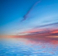 Sunset reflected in water.