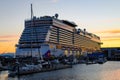 Sunset reflecting on the Norwegian Encore cruise ship in Seattle