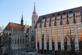 Sunset reflection of Budapest - Hungary next to a church Royalty Free Stock Photo