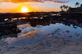 Sunset Reflection on The Keiki Beach Queens Bath Royalty Free Stock Photo