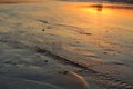 Sunset reflection off low tide waters