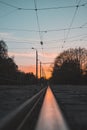 Sunset in reflection of a tram rail