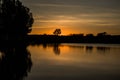 Sunset Reflection In Water With Trees Evening Park Scene