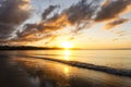 Sunset reflection in the wet sand Royalty Free Stock Photo