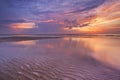 Sunset reflections on the beach, Texel, The Netherlands Royalty Free Stock Photo